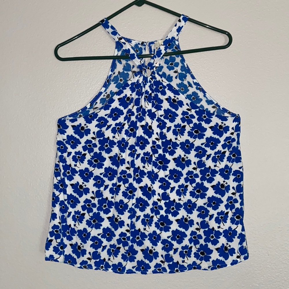 White and blue floral blouse